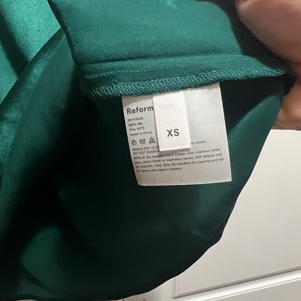 New without tags REFORMATION emerald green adjustable strap silk top.